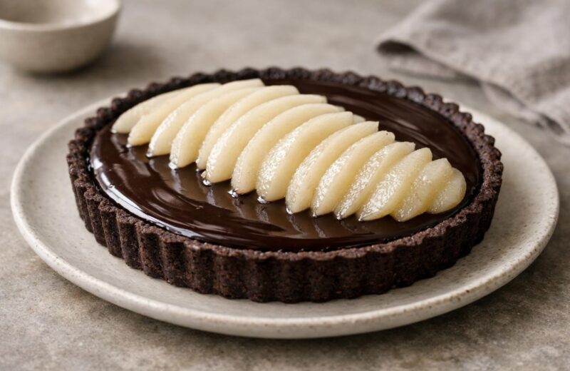 Chocolate pear tart with fanned poached pears